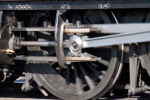 Ein Nahaufnahme eines Zugrades, das detaillierte Profil und Metallstruktur zeigt.