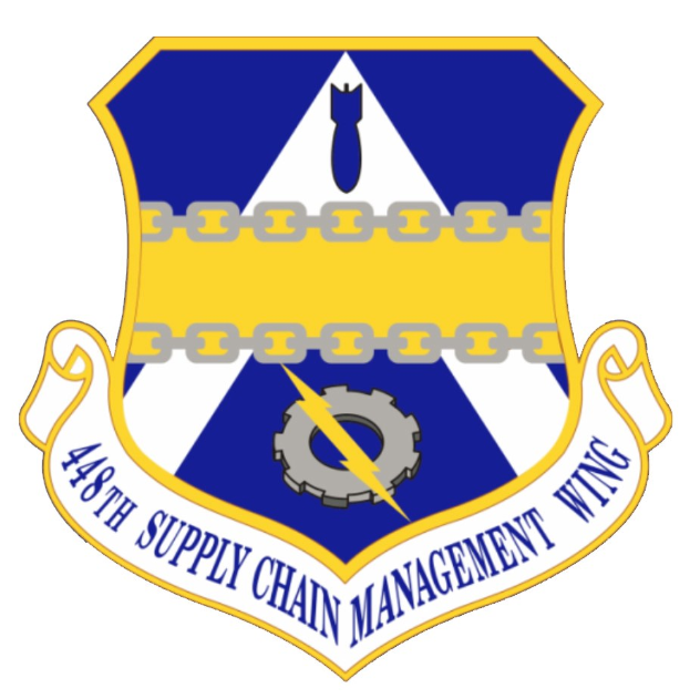 Logo der 48. Versorgungsmanagement-Schulter mit einem blauen Schild mit einem weißen Stern und einem weißen Banner mit der Aufschrift "Versorgungsmanagement" in blau, alles von einem weißen Rand mit schwarzem Text umgeben.