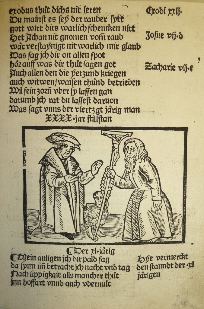 Ein Blatt Papier mit gedrucktem Text in einer fremden Sprache, mit zwei Männern im Hintergrund, möglicherweise aus einem Lehrbuch.