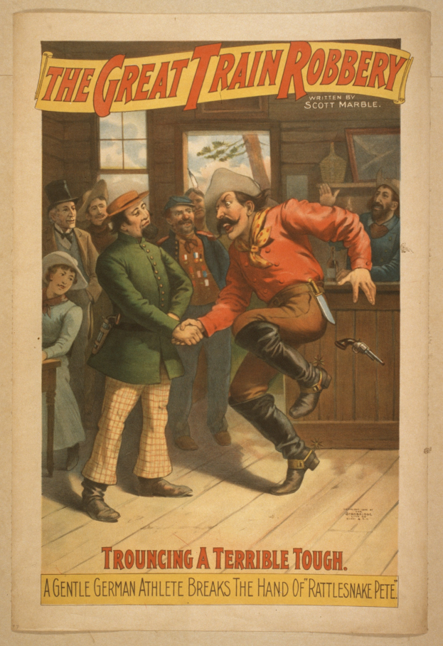 Ein Plakat, das eine Gruppe von Menschen auf dem Boden zeigt, einer hält eine Waffe, mit Text oben und unten: "Der große Zugraub - Trouching ein Schreckliches Tough".