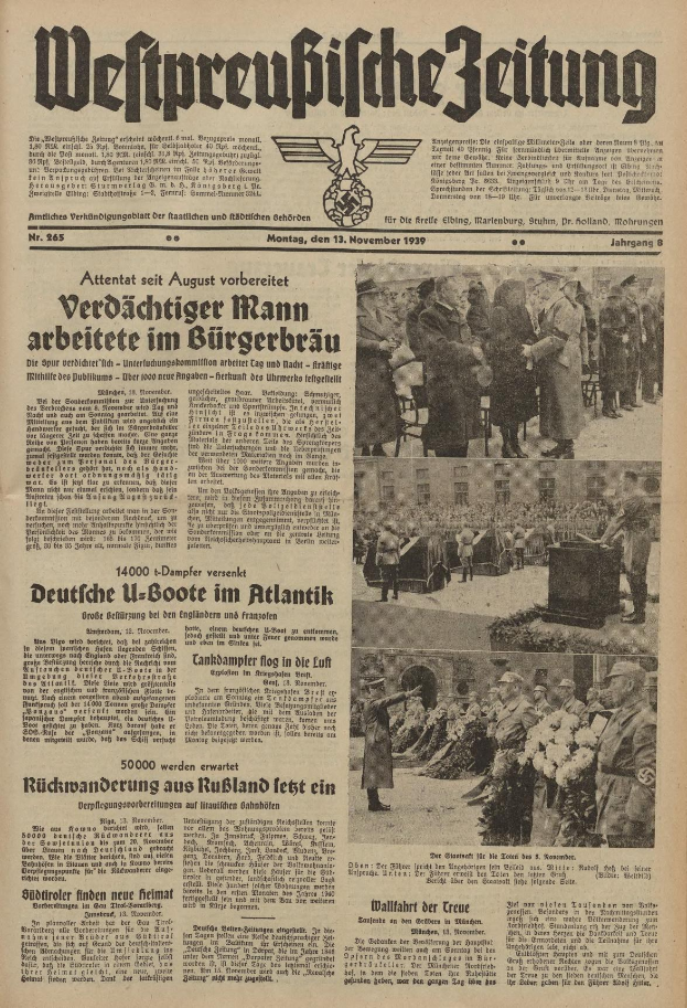 Schwarze und weiße Titelseite einer deutschen Zeitung vom 13. November 1939, betitelt "Weitpreubliche Zeitung", mit einem Gruppenbild von Menschen in traditioneller deutscher Tracht in einer feierlichen Atmosphäre.