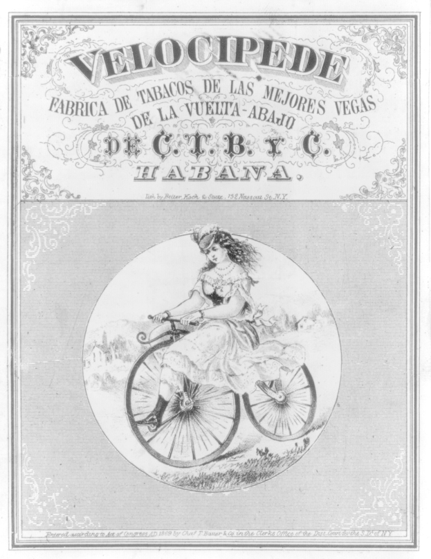 Eine Werbung für ein altes Fahrrad mit einer Frau, die ein Fahrrad fährt, und begleitendem Text.